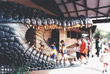 Children walking inside the "crocodile's mouth" at the Australian Reptile Park